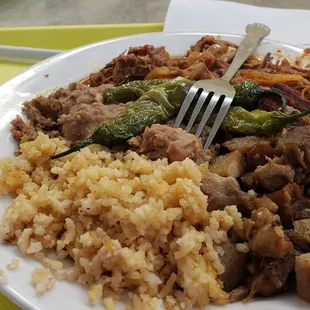 Beef desebrada, pork carnitas, rice, refried beans