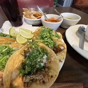 Tacos, Hibiscus agua Fresca, beans, salsas.