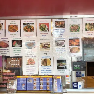 menus on the wall of a restaurant