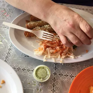Taquitos and my wife&apos;s hands