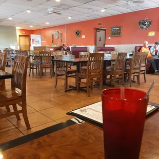 a restaurant with tables and chairs