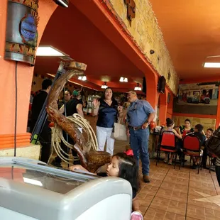 a group of people in a restaurant