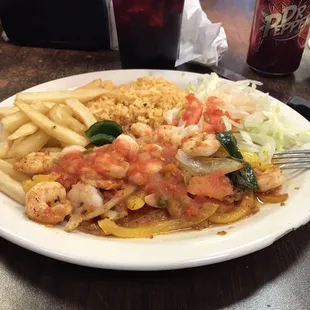 It looks very appealing but was bland.  Camarones rancheros.