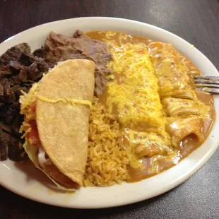 Enchiladas were undercooked, taste was actually ok. Beans, fine, taco fine, Fajitas slightly bland.