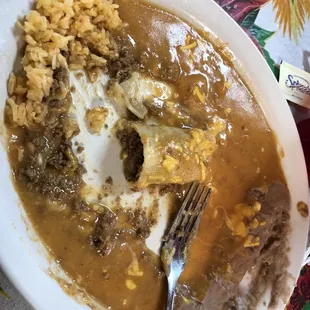 Enchiladas (plate full of sauce)