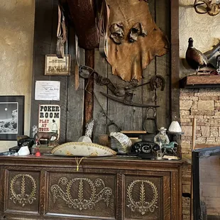 a fireplace with a bunch of items on it