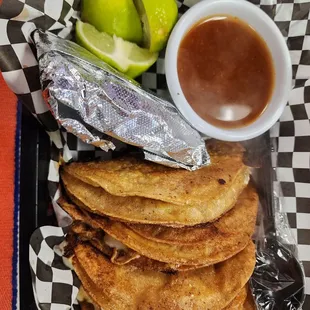 Birria tacos with consome.