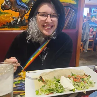 Seafood burrito and a very happy kid.