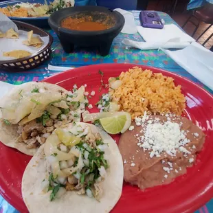 Got 2 chicken tacos flour tortillas refried beans and rice! The tortilla chips were the only thing that didn&apos;t impress me!