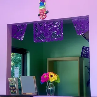 Festively traditional and that means COLORFUL. Not only the paint on the walls but the food is beautiful and delicious too XD!