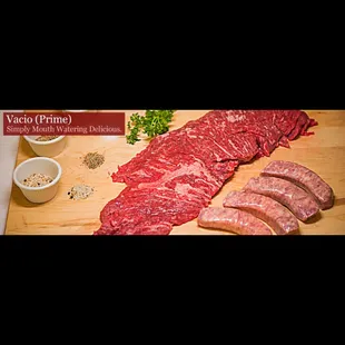 a variety of meats on a cutting board