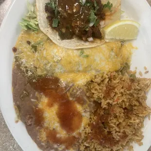 I'm gonna play with Al Pastore taco and green enchilada rice and beans