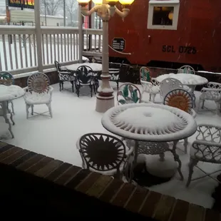 a snow covered patio