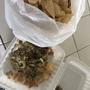 Shredded beef taco salad and bag of chips