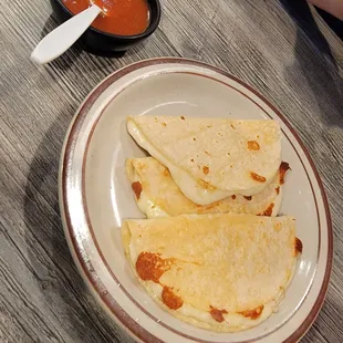two quesadillas on a plate