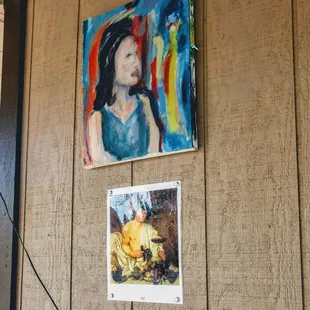 a painting of a woman and a cat