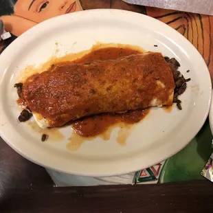 Steak Burrito with their traditional sauce