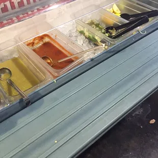 Salsa bar kinda neglected. Red sauce is not good - tastes like tomato sauce out of a can.