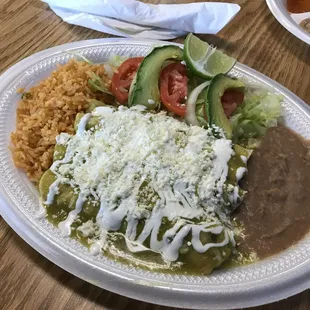 4ct Chicken Enchiladas, beans and rice..