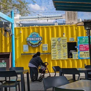 a woman pushing a stroller