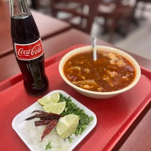a bowl of chili and a plate of rice