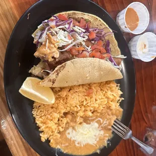 Fried fish taco with rice and beans