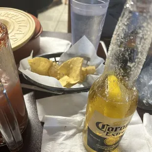 Cold bottle beer chips and salsa