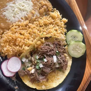 Birria taco with rice and beans