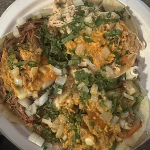 Three regular tacos: Pollo, Birria (goat), Fish