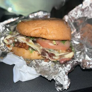 Asada Torta with everything on it (cilantro, onions, avacado, tomato).