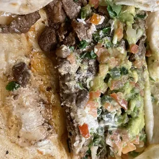carne asada burrito with guacamole &amp; sour cream