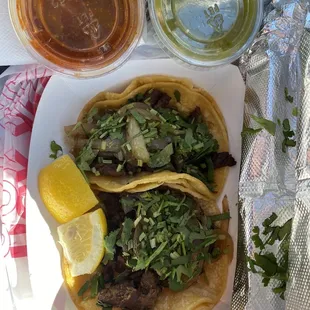 Two tacos and the salsas