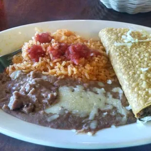 Lunch portion taco, rice, and beans