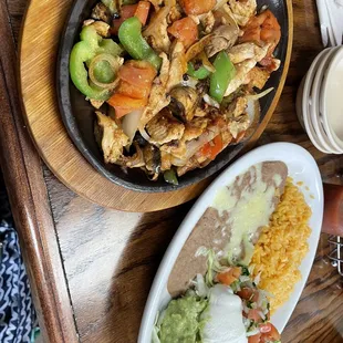 a plate of chicken and rice