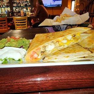 Happy Hour chicken quesadilla. Perfect amount of chicken to meat!