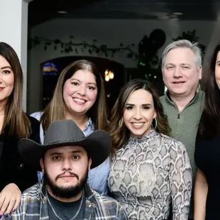 a group of people posing for a picture
