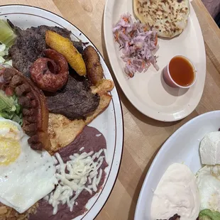 Number 2 on the left. Comes with deep fried pork, plantains, steak, chicken and sausage. Omg delicious! Top is pupusa. MUST HAVE!