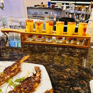 Cucarachas and mango shot tray