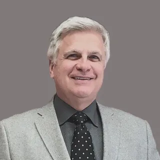 John E.