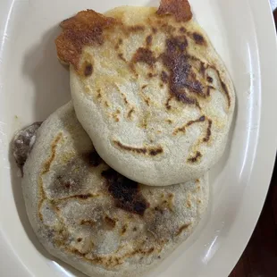 Chicken papusa and bean and cheese papusa