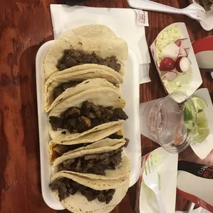 Tacos de carne asada, adobado, and lengua.