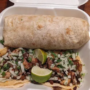 Bean, cheese and rice burrito, two carnitas tacos