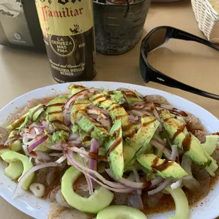 Aquachile Rojo and tostada mixta in the other photo