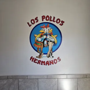 a sign on the wall of a restaurant