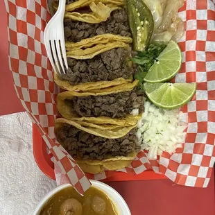 Steak mini tacos with toppings on the side