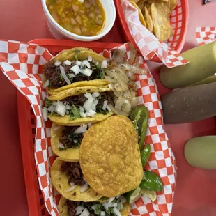 Barbacoa mini tacos(corn tortillas) and charro beans(they're a combo).