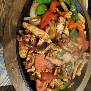 a bowl of chicken and vegetables