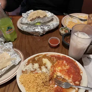 Huevos rancheros, horchata, jarrito, and carne de asada tacos