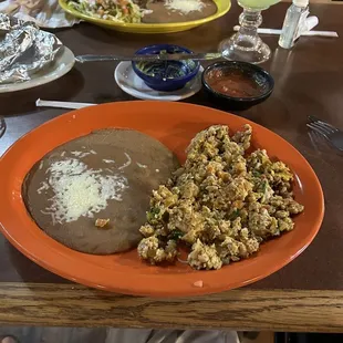 Huevos Mexicanos with frijoles.