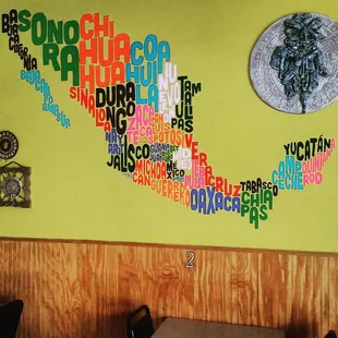 a map of the world on a wall